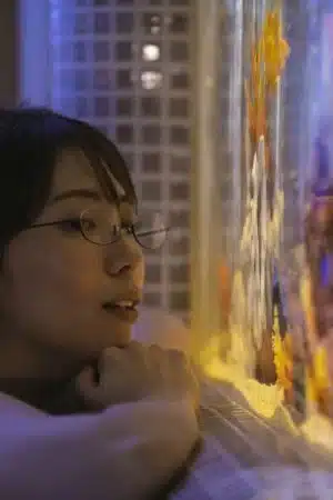 Female teacher closing the door